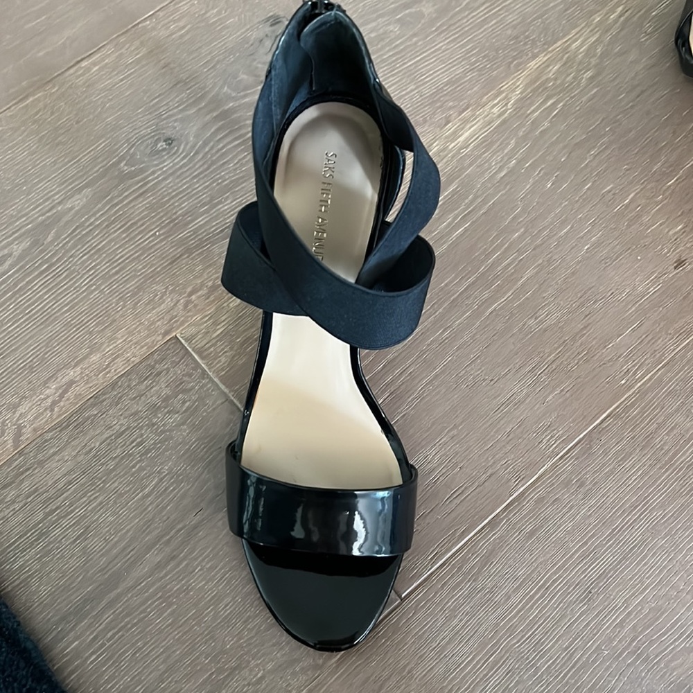 Patent leather Saks Fifth Avenue  heels with super back.  Size 9